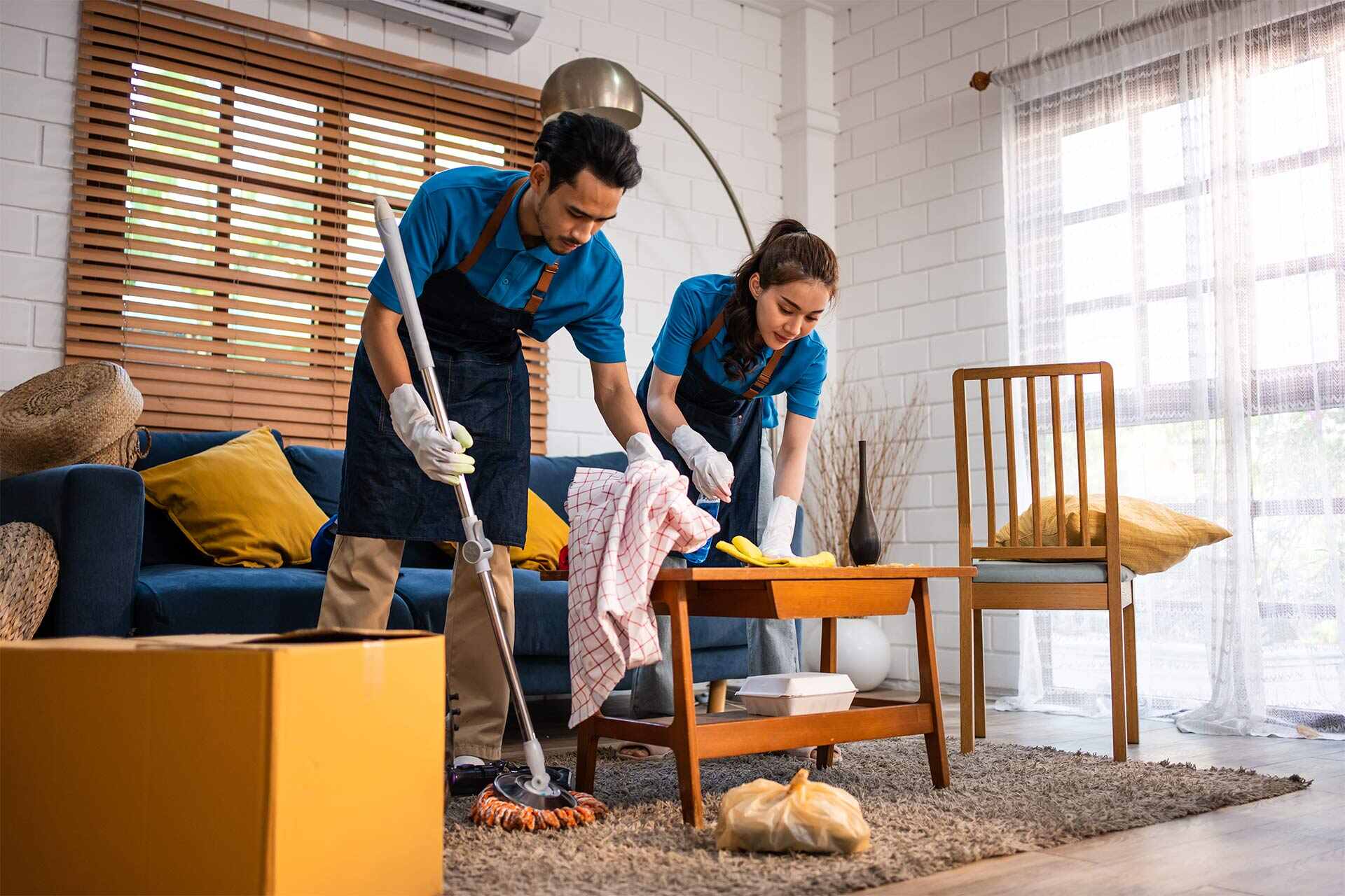 asian-young-man-and-woman-cleaning-service-worker-2023-11-27-05-01-56-WHJUADZ.jpg
